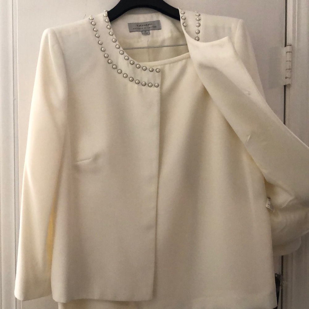 Pearl-accented white suit